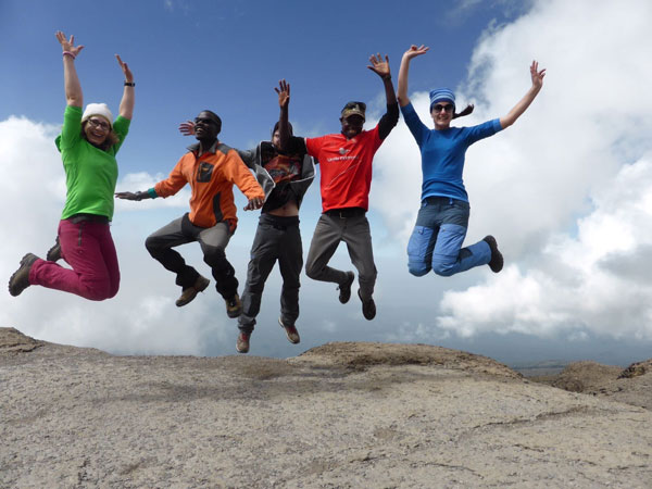 happy Group hiking kilimanjaro